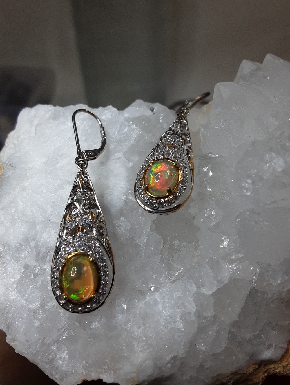 925 genuine opal, and zircon drop earrings.